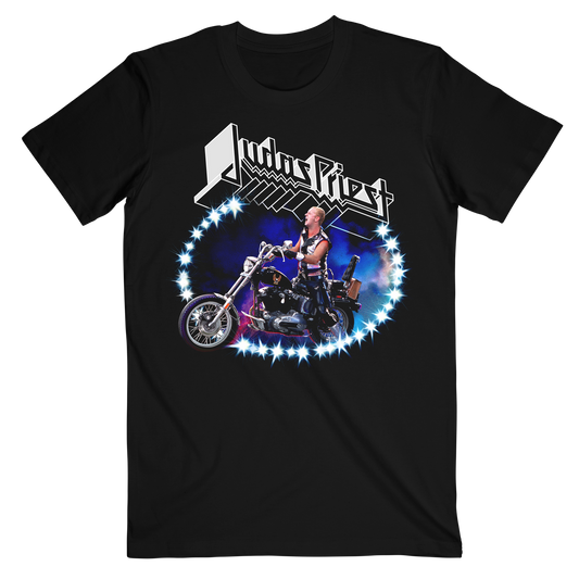 A black short-sleeve graphic t-shirt featuring the band Judas Priest's logo above an illustration of a man on a motorcycle surrounded by a blue starburst circle.